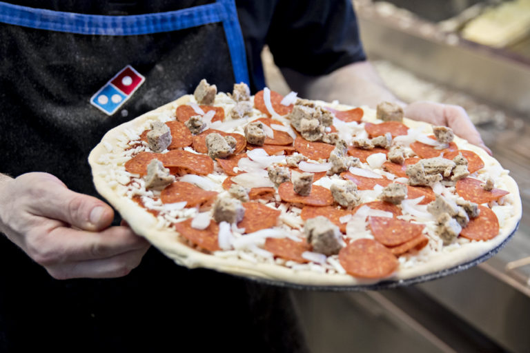 Domino’s Pizza sees hovering meals prices in 2022, backs long-term outlook