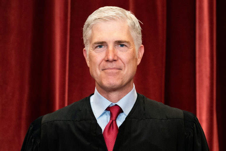 Supreme Court docket Justice Neil Gorsuch has no masks regardless of Covid spike