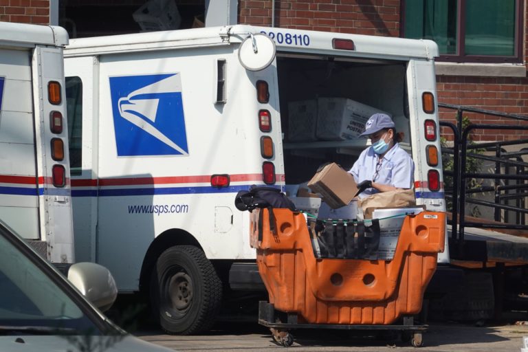 Biden urges in opposition to USPS plan to spend billions on fuel automobiles