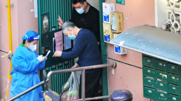 WHO says it carefully watching as China grapples with its worst Covid surge but