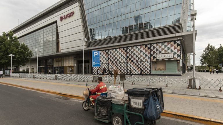 China sticks to Covid controls, Beijing luxurious mall closes