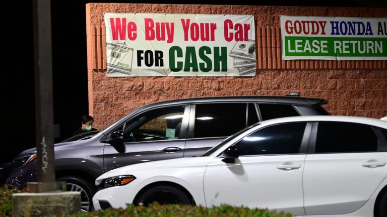 Used-car costs are down from report highs, easing the influence of inflation