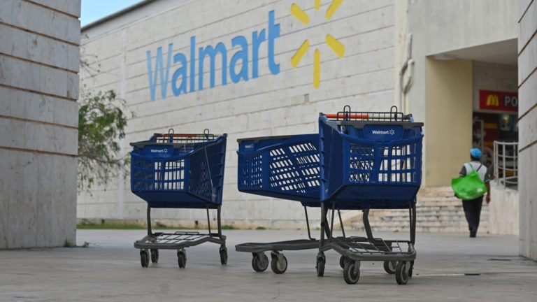 Walmart shares stoop after retailer cuts revenue outlook on inflation issues