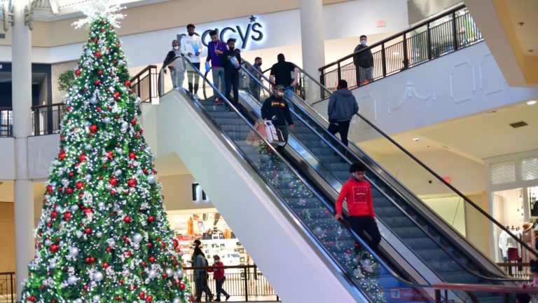 Shoppers are reducing again on vacation reward shopping for amid increased inflation
