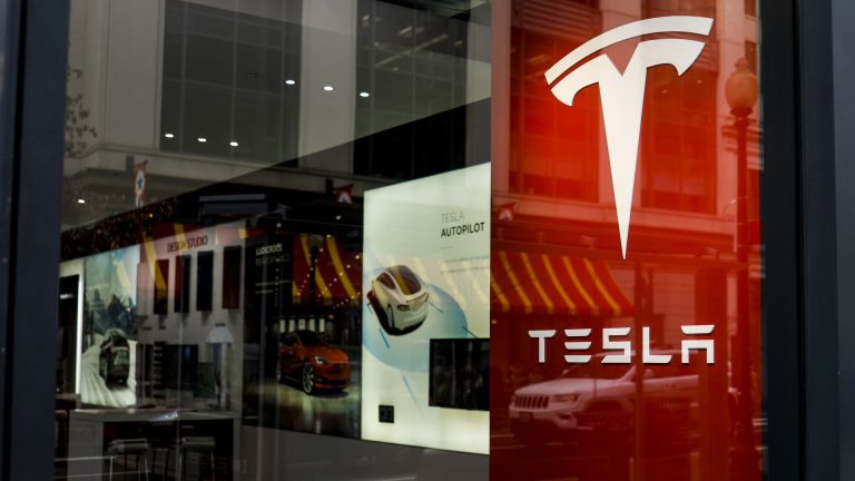 Tesla’s worth cuts may spur an EV pricing battle