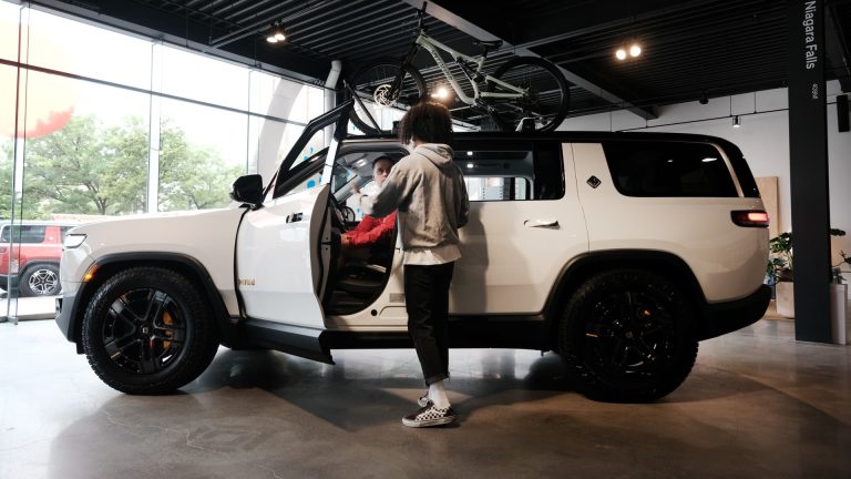 Rivian shares surge as second-quarter EV deliveries high estimates