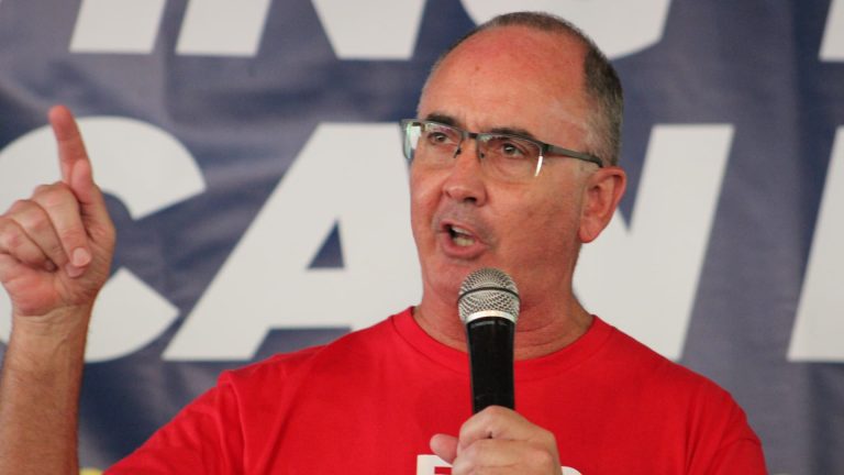 UAW chief says strike would ship Biden a message