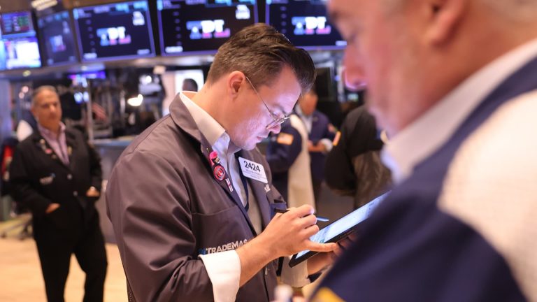 Shares slide forward of Powell’s speech